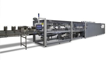Eine industrielle Verpackungsmaschine von KHS steht in einer Produktionslinie, die Flaschen für den weiteren Verpackungsprozess vorbereitet.